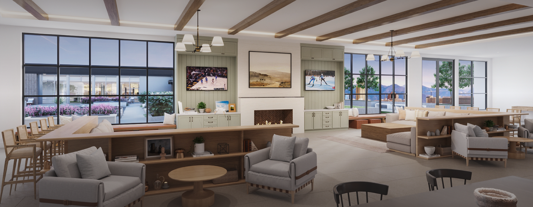 Resident clubhouse with ample seating, fireplace, demo kitchen and TVs
